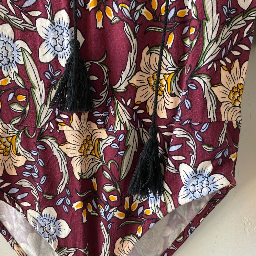 FLORAL BODYSUIT LONG SLEEVE WITH TASSELS. NEVER WORN. NWT. - Picture 8 of 9